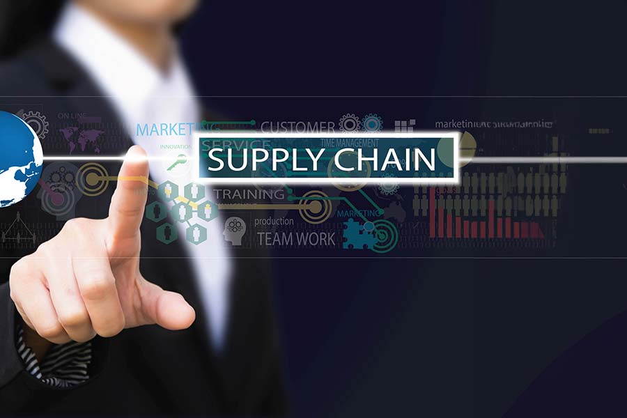 A hand interacting with a touchscreen for inventory management solutions
